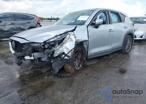 2019 Mazda Cx-5 Sport z USA, uszkodzony, nr VIN JM3KFABM6K0659109